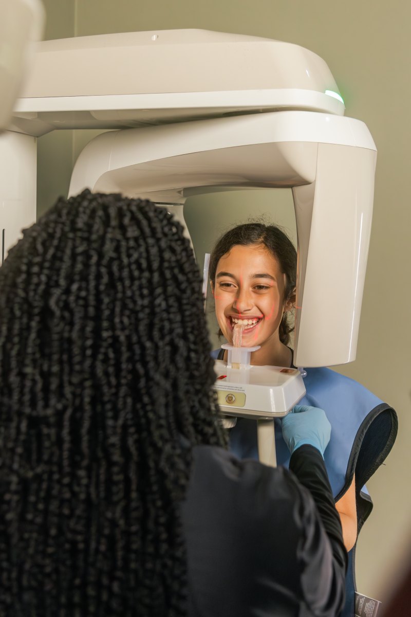 orthodontics patient model getting a 3d scan of her mouth